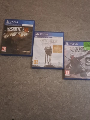 3 PS4 spel 150kr för 1 - Säljer tre PlayStation 4-spel: Resident Evil 7 biohazard från Capcom, Star Wars Battlefront Ultimate Edition och Homefront The Revolution. Perfekt för dig som gillar action, skräck och äventyr.