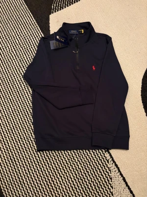 Polo zip - Helt ny i storlek XS dm vid intresse
