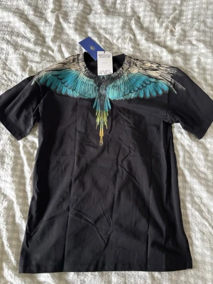 Marcelo Burlon T shirt - Marcelo Burlon T-Shirt. Aldrig använd. Storlek M. Fraktar och Möts upp
