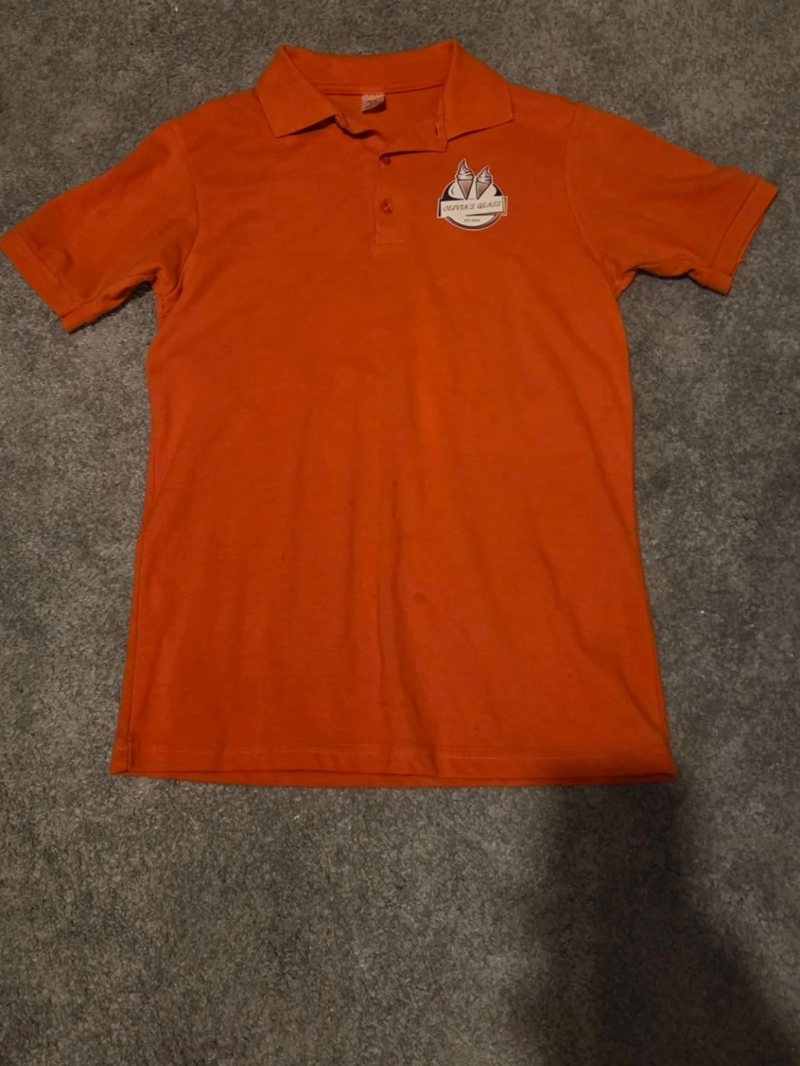 Orange pikétröja Olivias Glass