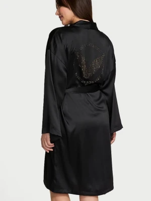 Svart satinmorgonrock från Victoria's Secret - Snygg svart morgonrock i satin från Victoria's Secret med glittrande logga och vingar på ryggen. Inte använts någon gång. 