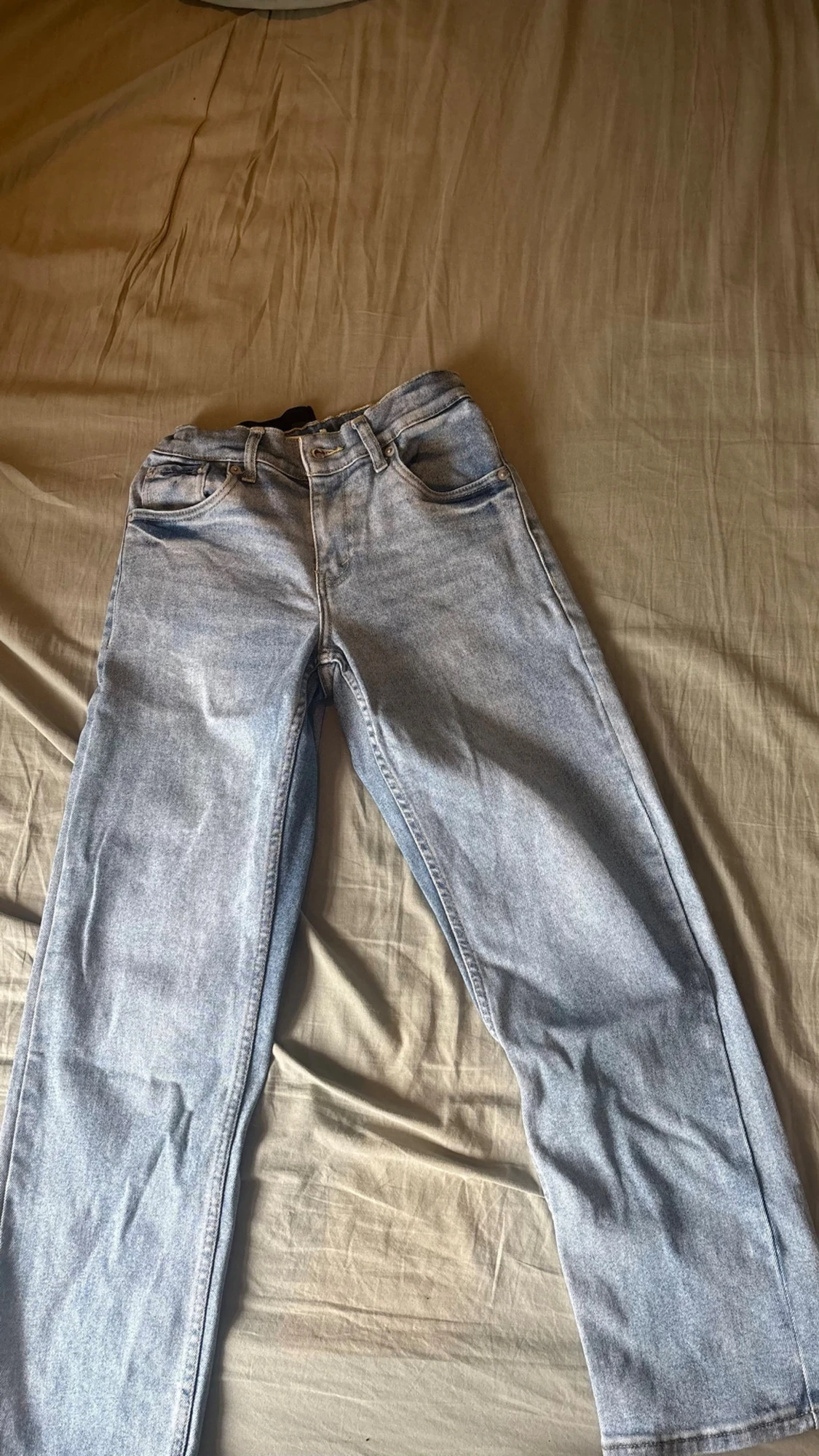 Ljusblå Levis jeans