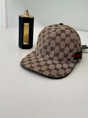 Beige gg keps  - Beige gg keps, helt ny storlek M-S