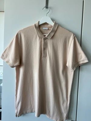 Beige pikétröja från Celio  - Beige/kaki pikétröja från franska märket Celio