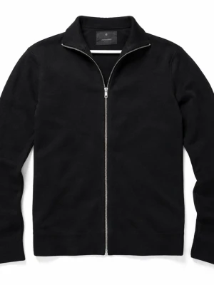 Svart ziptröja från Jack & Jones - Säljer en svart ziptröja från Jack & Jones Premium med hög krage och hel dragkedja framtill. Tröjan är tillverkad i mjukt stickat material och har en stilren design. Nypris runt 500kr..