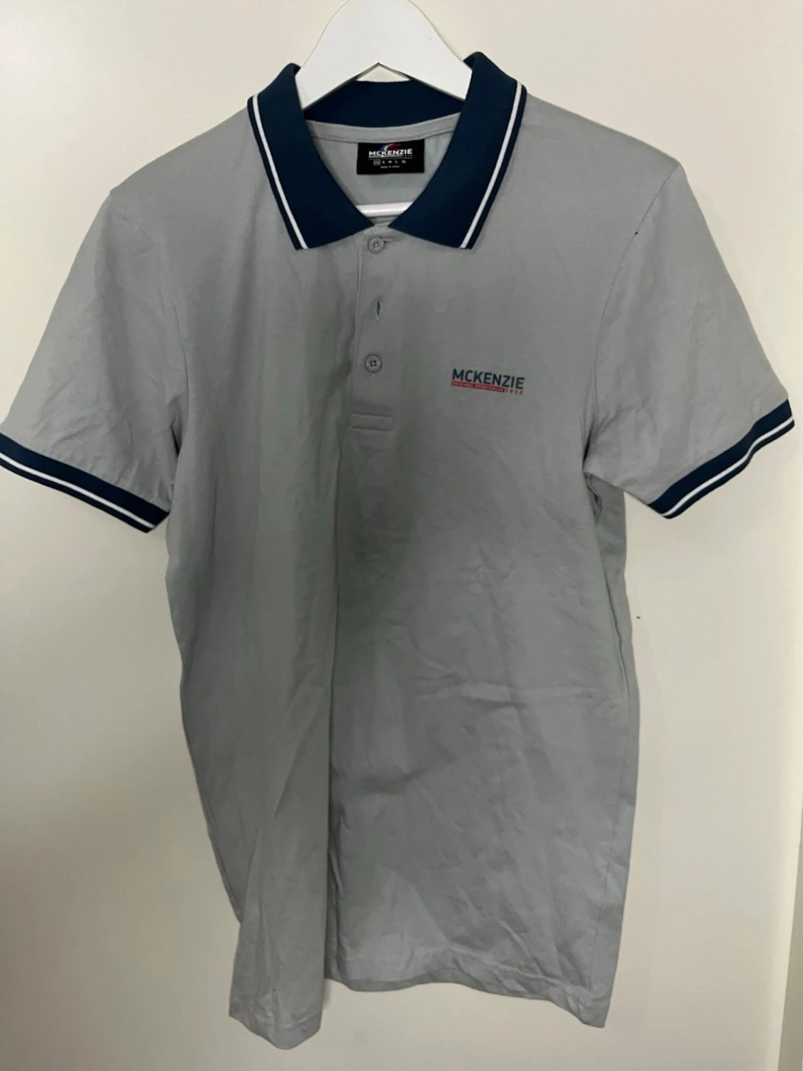 Grå pikétröja från McKenzie