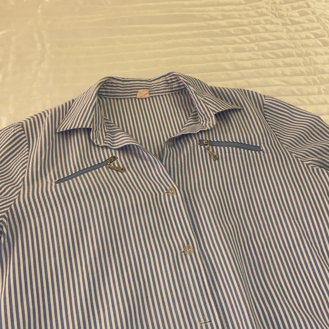 Blå-och vitrandig topp - 91