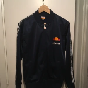  - ellesse track använd en gång