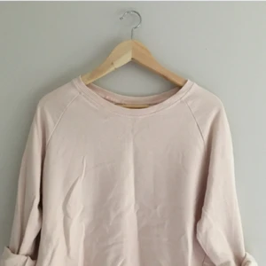  - Ljusrosa tjocktröja från H&M