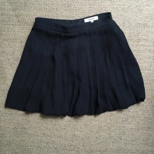  - Pleated skirt from Whyred.