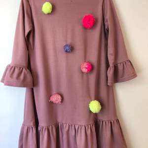 Croatian design Lukabu. Dress with pom poms. It fits sizes 34-40. Pick up available in Kungsholmen Shipping 55 SEK Please check out my other items! :)