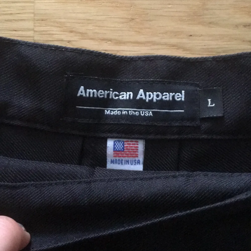 American apparel tennis skirt in black. Great condition . Kjolar.