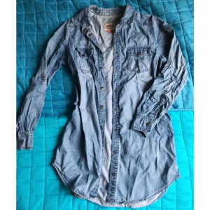  - Jeans shirt, size 34, a bit longer than till waist, looks great with black leggins!