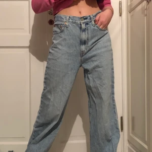 Levis jeans - Ett par Levis jeans i modellen ribcage wide leg som köptes nya för ca 1,5 år sedan. Väldigt bra skick 