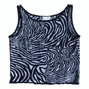 Vintage Escada crop top  - Supersnygg vintage Escada croptop i Zebra mönster. Storlek 34 men passar upp till 38.