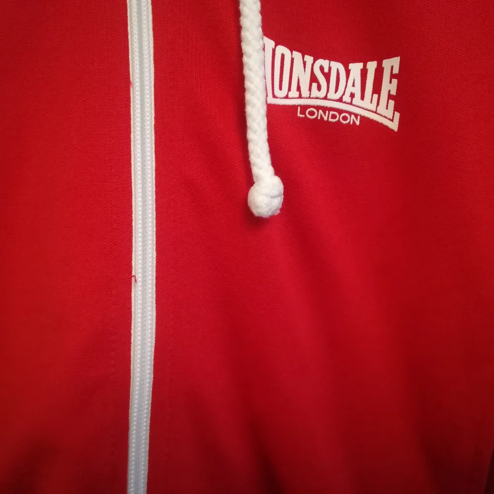 Beautiful retro Lonsdale London hoddie in a great condition. Originally size L, but would fit more as a M/S size. . Hoodies.