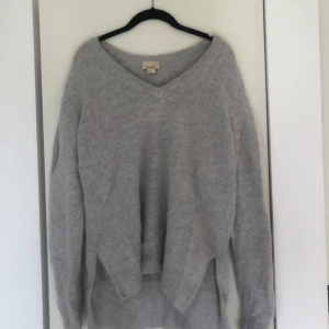 - Stickad tröja i angora från HM Trend. Aldrig använd! 