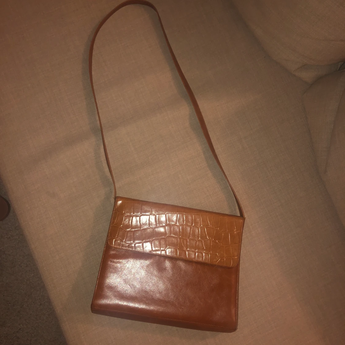 Brown leather cross body bag