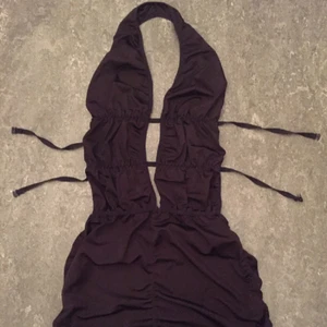  - Svarta klänning. Elastisk. "Minidress" 