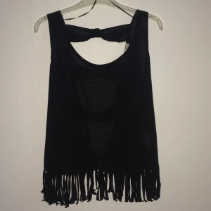  - Fin tröja med rosett på ryggen