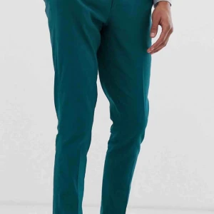  - Oanvända kostymbyxor