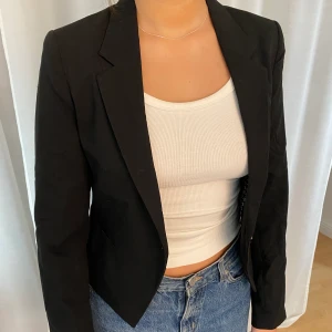 Svart kavaj - Passar S-M