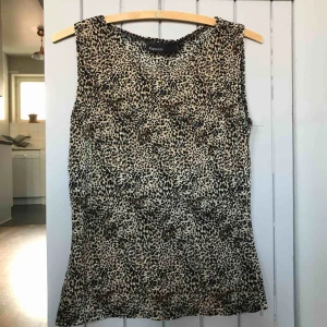  - Plisserad leotopp fr KappAhls 90-talsplagg