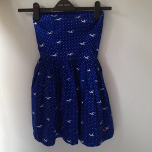  - (Price is discussable)
Hollister, blue dress with white polka dots 
Only used once 