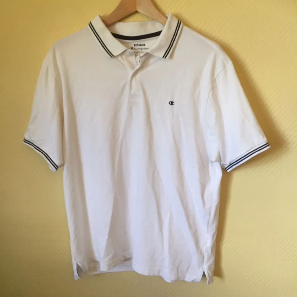 Champion poloshirt. It is a couple of years old however it has got no defects.. T-shirts.
