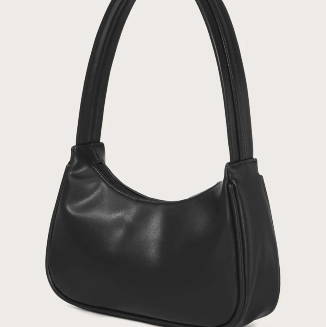 Svart axelväska i fakeskinn - 90