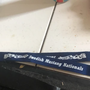 Mustang nyckelband  - Helt nytt nyckelband . Står Swedish Mustang Nationals på.20 plus frakt ❣️