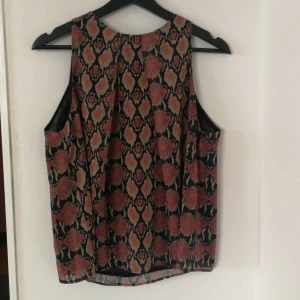 Mango blouse with animal pattern - L size blouse from Mango