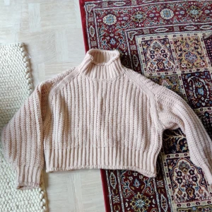 - Ljusrosa stickad tröja från HM