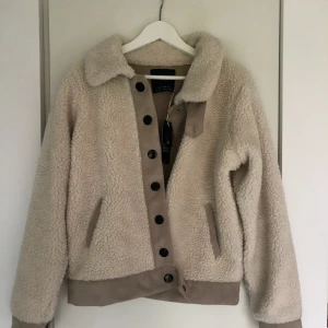  - Ny med lapparna kvar. 58 kr frakt 