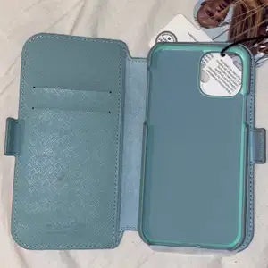 Helt nytt oanvänt plånboksfodral till iPhone 11Pro/Xs/X i fin mintgrön färg. Säljer pga köpte till fel telefon. 💚