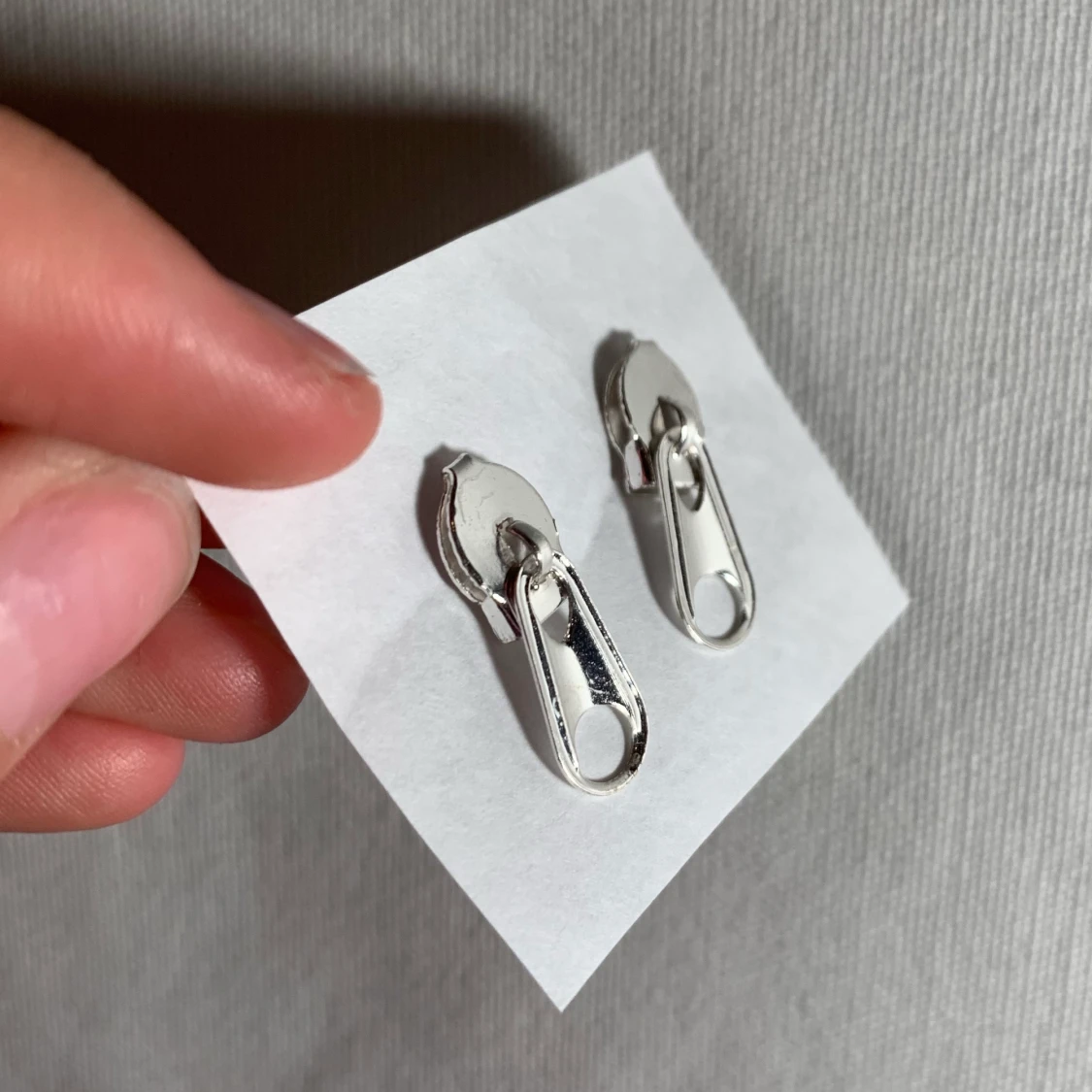 Blixtlås örhängen  - 90