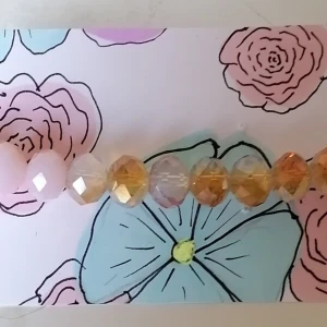 Armband  - Armband i rosa och bärnsten. 