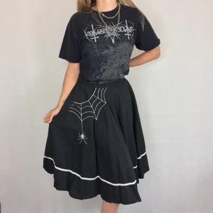 Skirt  - A super badass mid skirt from Hell Bunny! Spiderweb on both sides. Labeled as an 2XL. 100% cotton. No return nor refund. Free shipping everywhere in Sweden. Waist 46cm. 