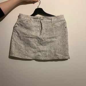 Kjol Leopard print M - Size: M