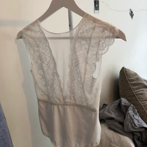 Spets body - Aldrig använd utan enbart testad