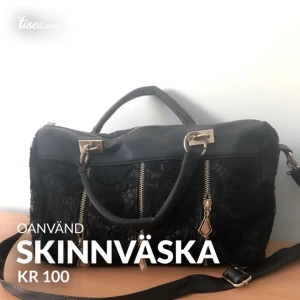  - Skinnväska