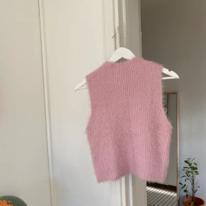 Mysig väst - Använd en gång 