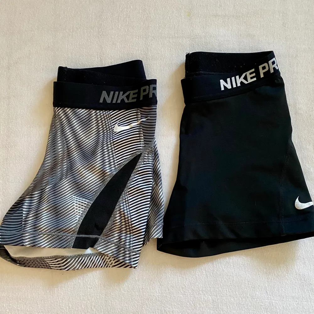 Två par Nike shorts, slitet märke på de svarta (se sista bilen). Shorts.