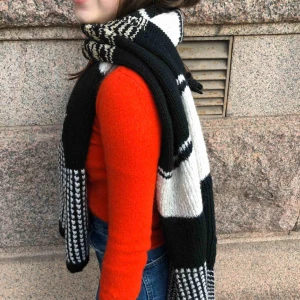 - Knitted stretchy long scarf. White and black with gold accent