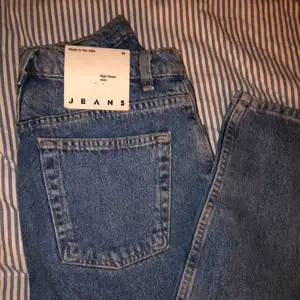Brand new American Apparel High waist jeans.    Size 28. :))