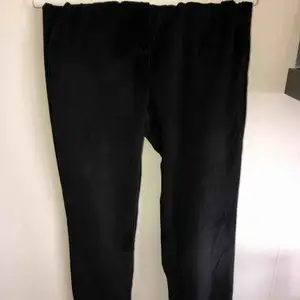 Black velvet trousers. New. Perfect condition. No need iron for smart wardrobe lovers.