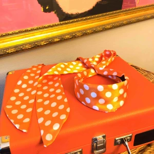  - Cute orange hair band with white dots Very 50’s