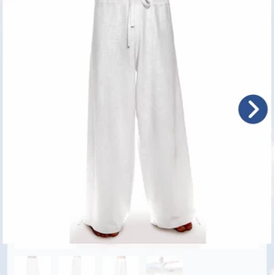 Fairtrade- linnebyxor från Schazad - Vita oanvända linnebyxor från märket Schazad i fairtraide-linne. Passar både män som kvinnor. Passar för det mesta som yoga, meditation, dans, sport. Ligger kvar i oöppnad förpackning. Nypris 900:-