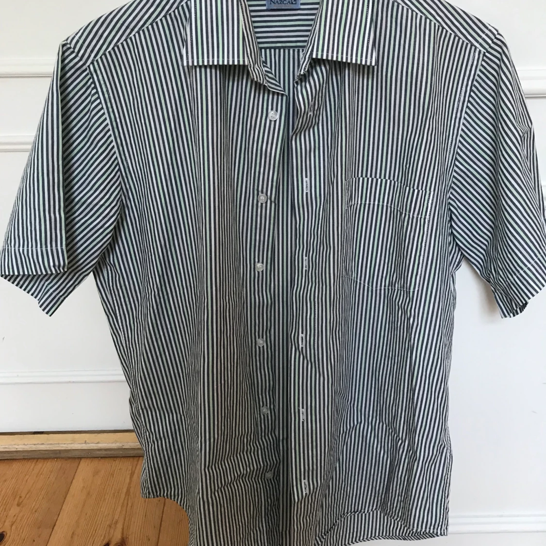 Kortärmad randig skjorta strl M - 90