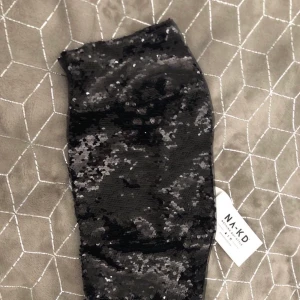 Nakd glitter top - Super fin top! Aldrig andvänt!!                                        Ville ha den under en skorta, dock var den för liten när den kom:( storlek 40